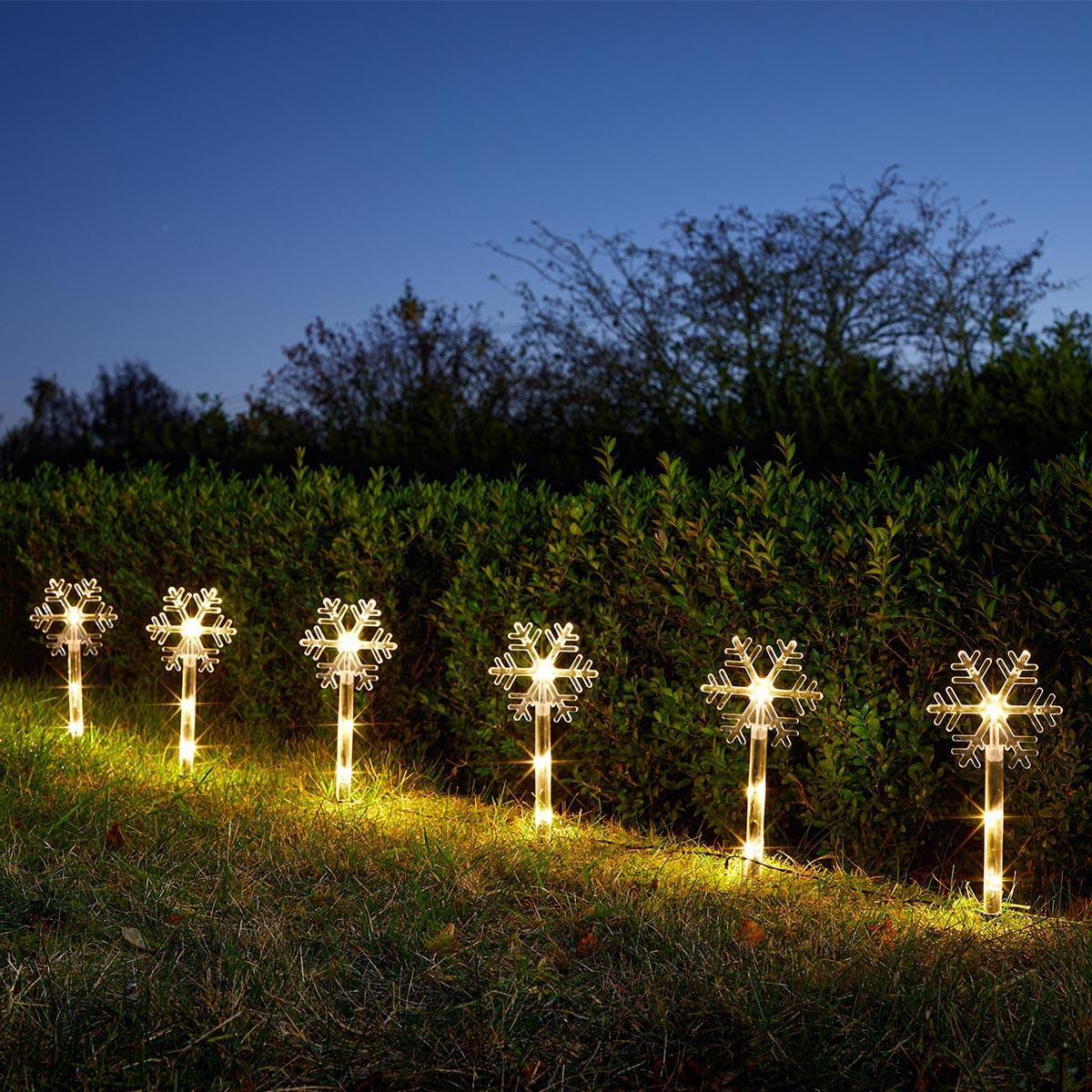 8 Snowflake LED Outdoor Battery Christmas Light Stakes 35cm