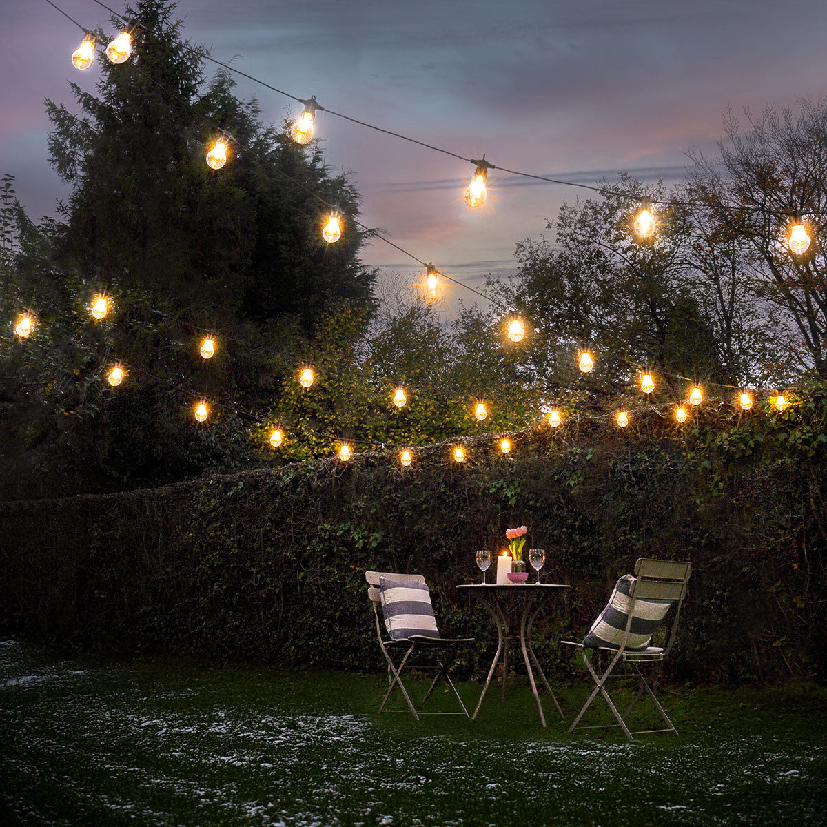 Connectable Festoon Lights with A60 Filament Effect Bulbs on Black Rubber Cable