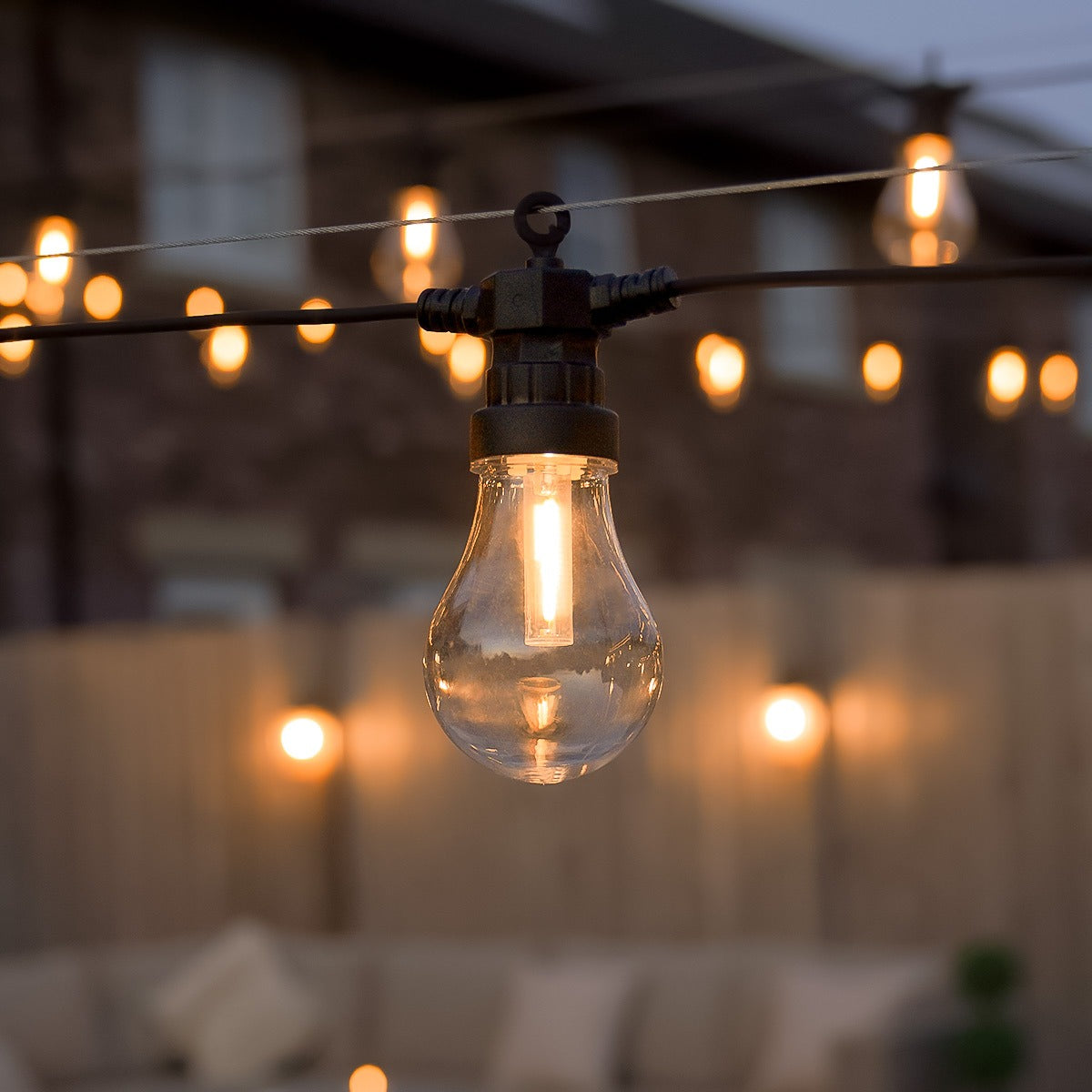 Connectable Festoon Lights with A60 Filament Effect Bulbs on Black Rubber Cable