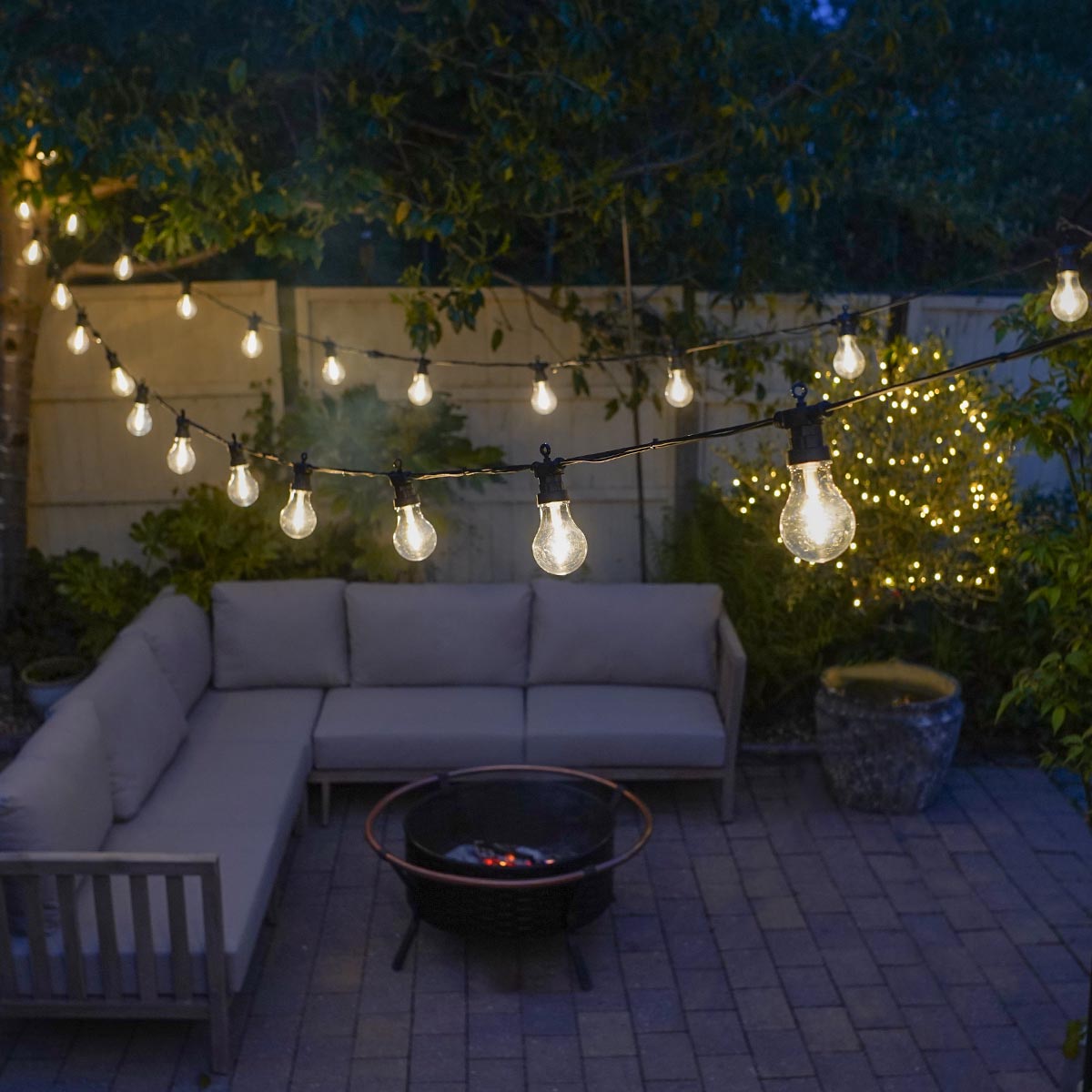 Connectable Festoon Lights with A60 Filament Effect Bulbs on Black Rubber Cable