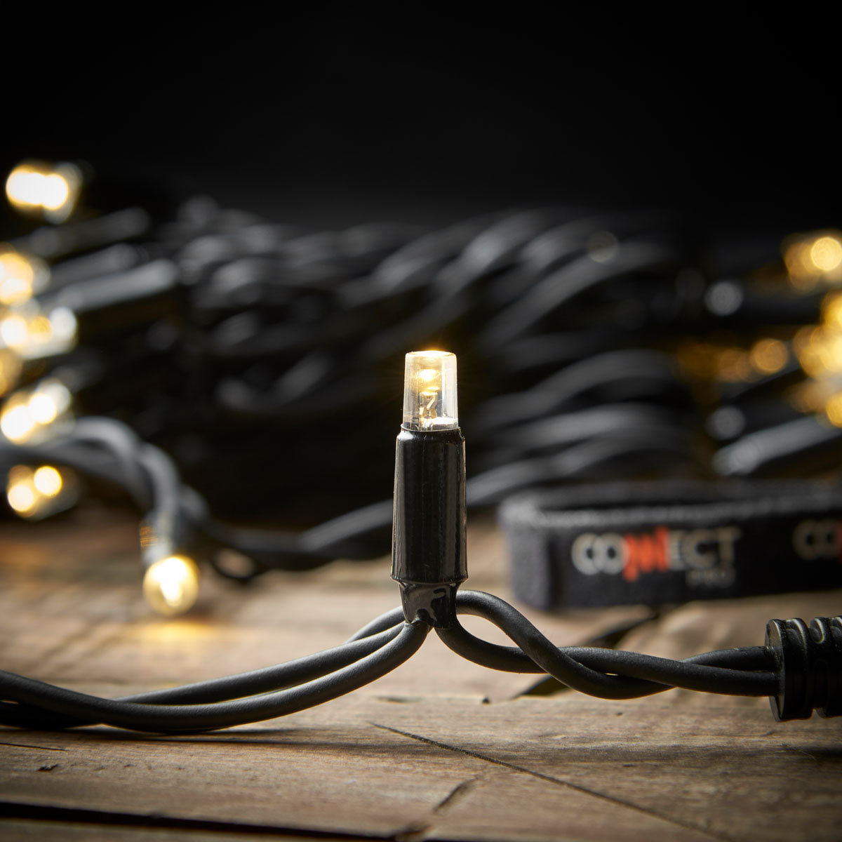 ConnectPro® Outdoor String Lights, Warm White with White Flash LED, Black Rubber Cable