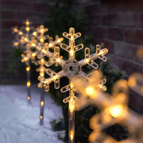 4 Warm White Outdoor Battery Snowflake Christmas Light Stakes 43cm