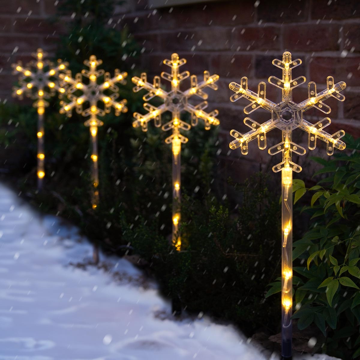 4 Warm White Outdoor Battery Snowflake Christmas Light Stakes 43cm