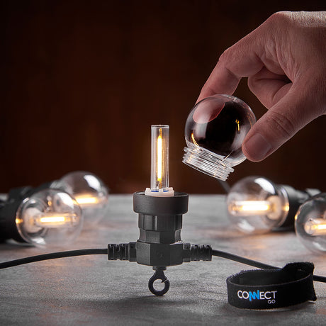 Connectable Festoon Lights with G50 Clear Filament Effect Bulbs on Black Rubber Cable