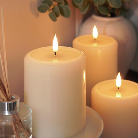 Ember™ Ivory LED Chapel Pillar Candle with Large Wax Pooling Effect
