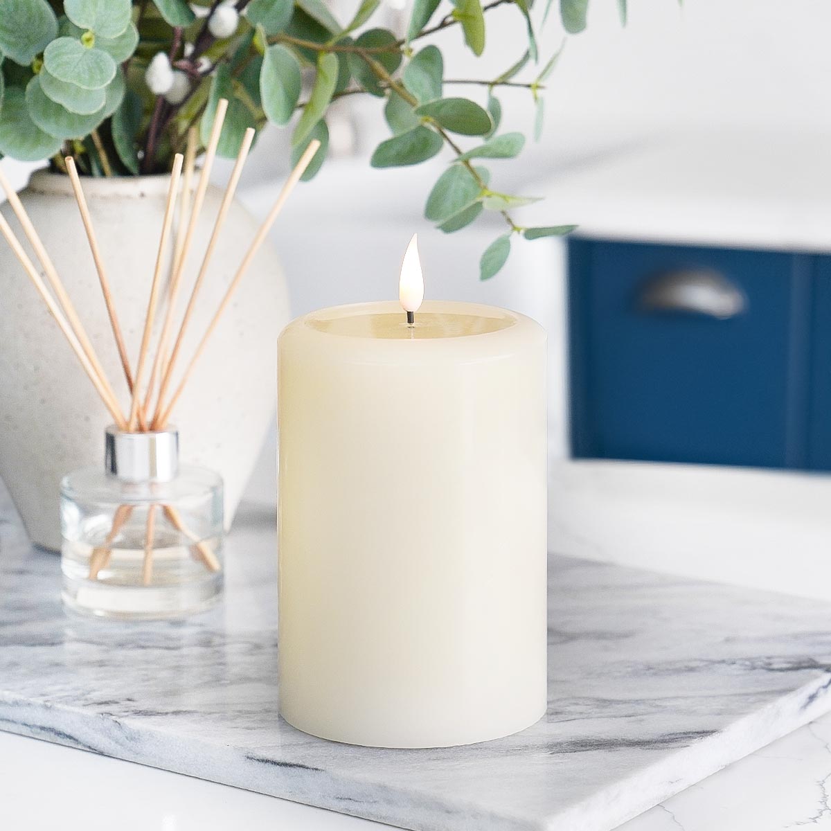 Ember™ Ivory LED Chapel Pillar Candle with Large Wax Pooling Effect