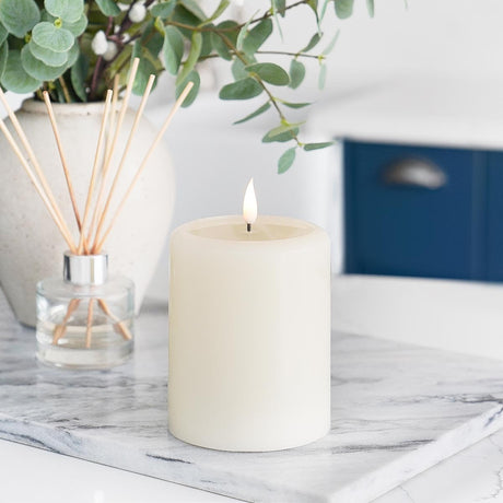 Ember™ Ivory LED Chapel Pillar Candle with Large Wax Pooling Effect