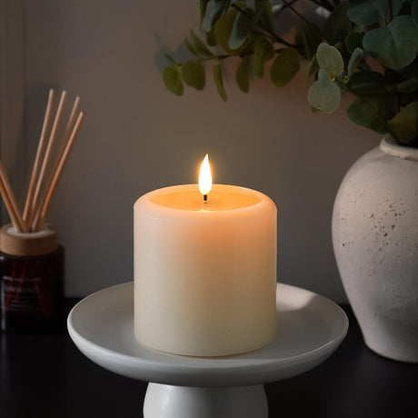 Ember™ Ivory LED Chapel Pillar Candle with Large Wax Pooling Effect