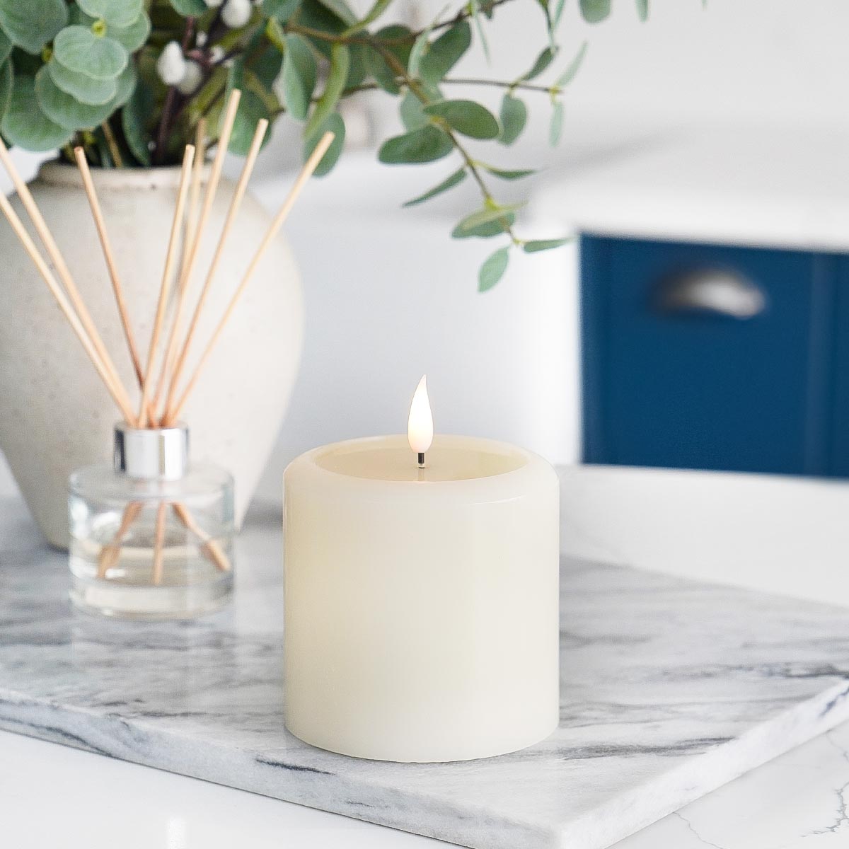 Ember™ Ivory LED Chapel Pillar Candle with Large Wax Pooling Effect
