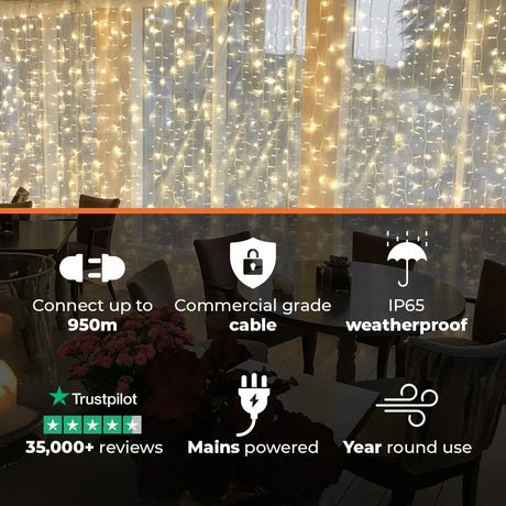 Connectable Warm White Curtain Lights on White Rubber Cable
