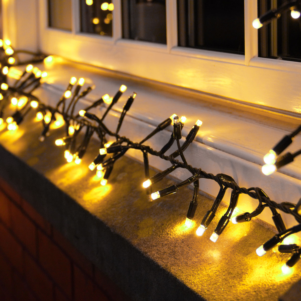 ConnectPro® Warm White Flashing Connectable Outdoor Cluster Lights On Black Cable