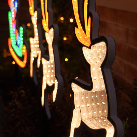 Outdoor Infinity Mirror Santa Sleigh with Reindeer Stake Lights